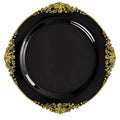 Black decorative plate with intricate gold ornate pattern around the rim, isolated on white background