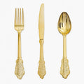 Gold vintage-style fork, knife, and spoon set with ornate handles on white background
