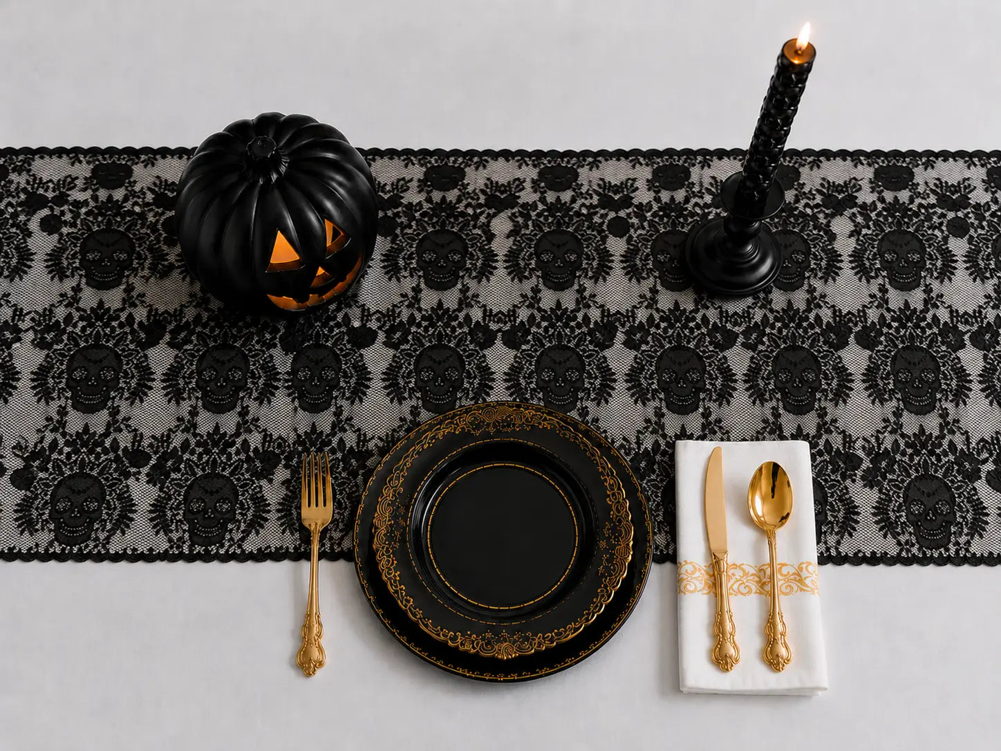 Gothic Halloween black and gold tableware set with skull lace table runner, black pumpkin, candle holder and gold cutlery
